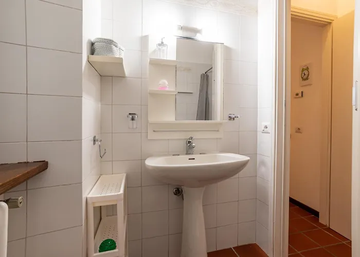 Guesthost - Cozy Apartamento *