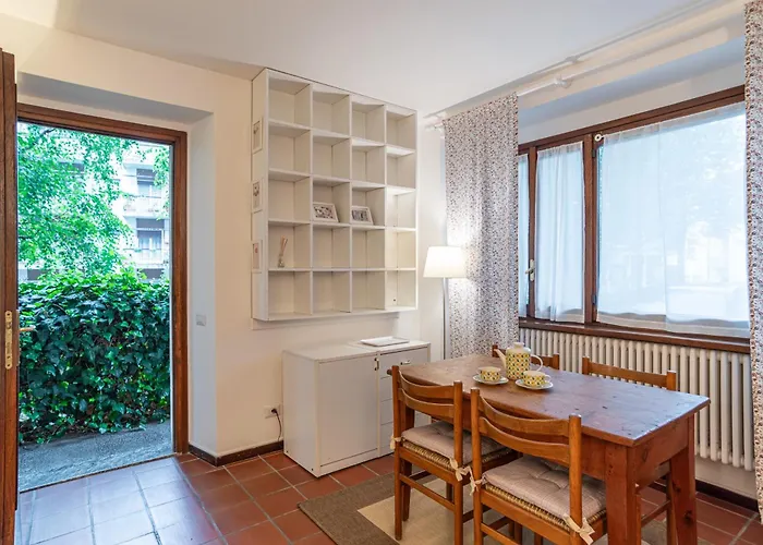 Guesthost - Cozy Apartamento